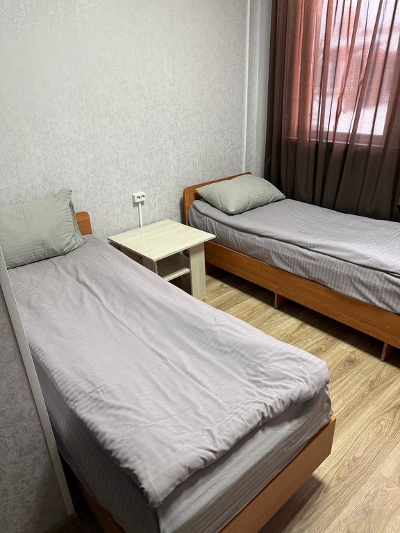 Трёхместный номер Трехместный номер эконом (3 односпальные кровати)