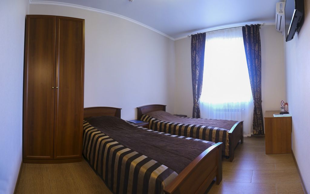 Двухместный номер с 2 отдельными кроватями полулюкс