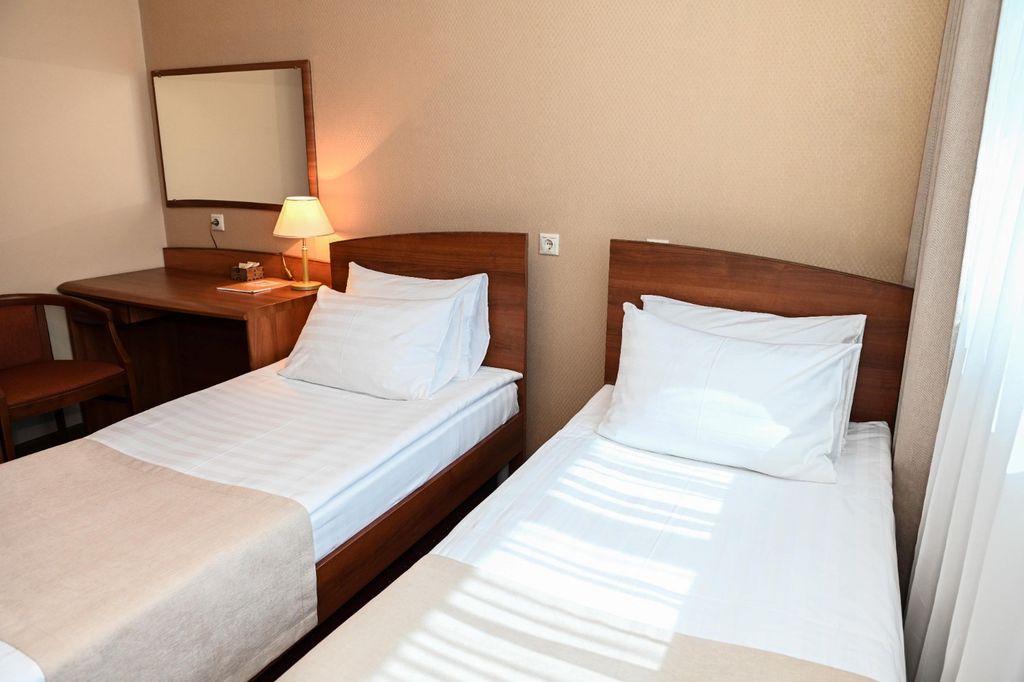 Двухместный номер с 2 отдельными кроватями стандарт двухкомнатный