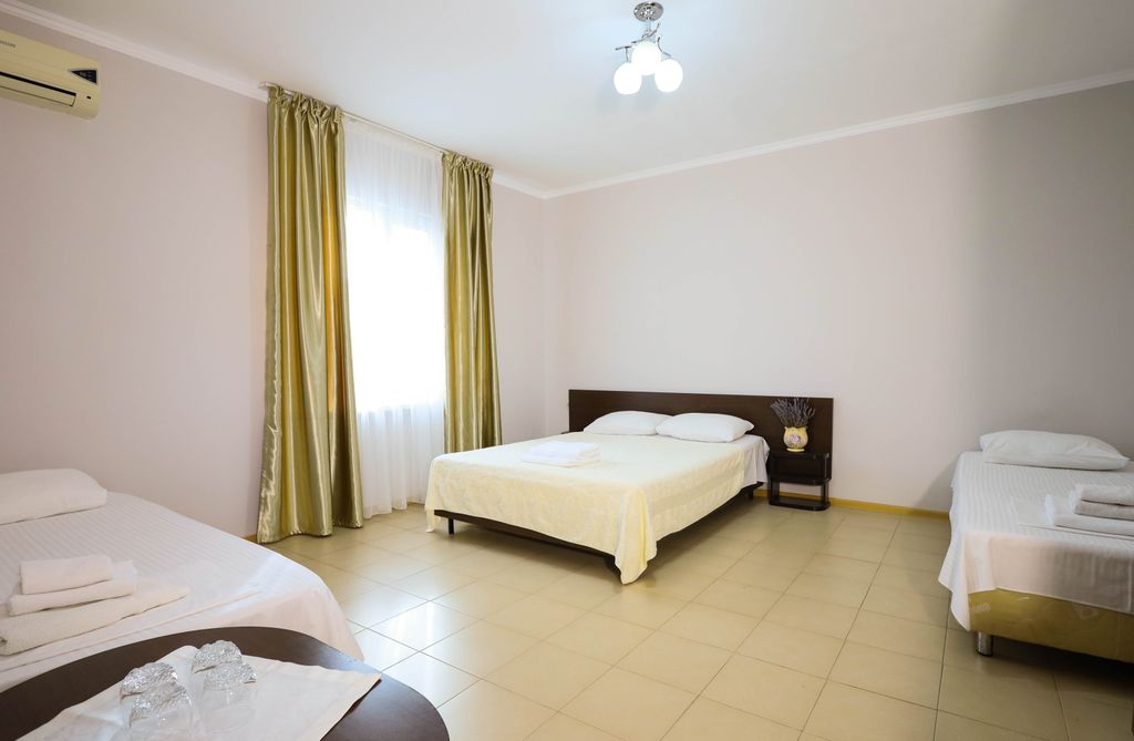 Четырёхместный номер Четырехместный номер