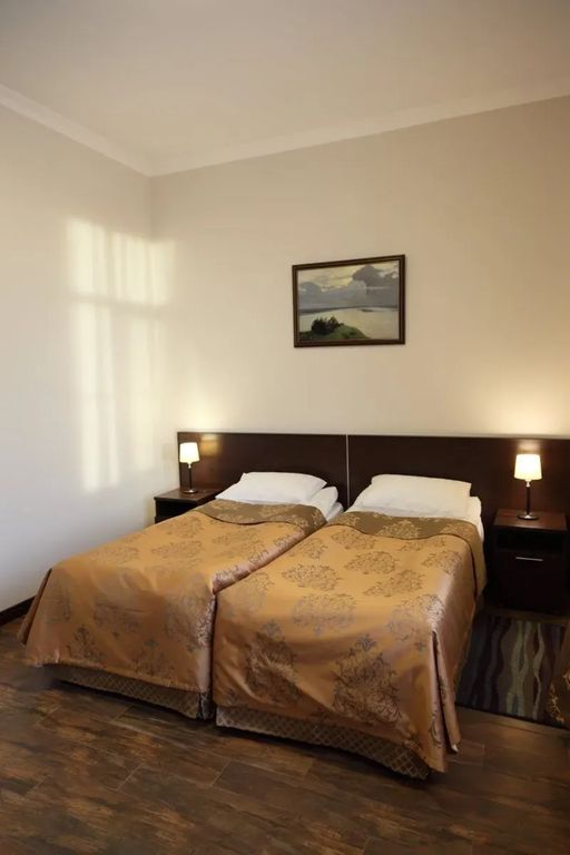 Двухместный номер с 2 отдельными кроватями или с одной большой двуспальной кроватью стандарт (с доп. местом)