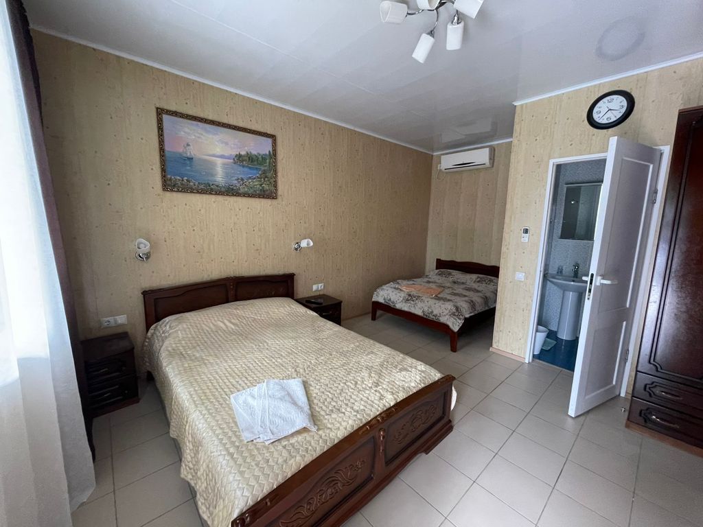 Семейный номер с двумя двуспальными кроватями