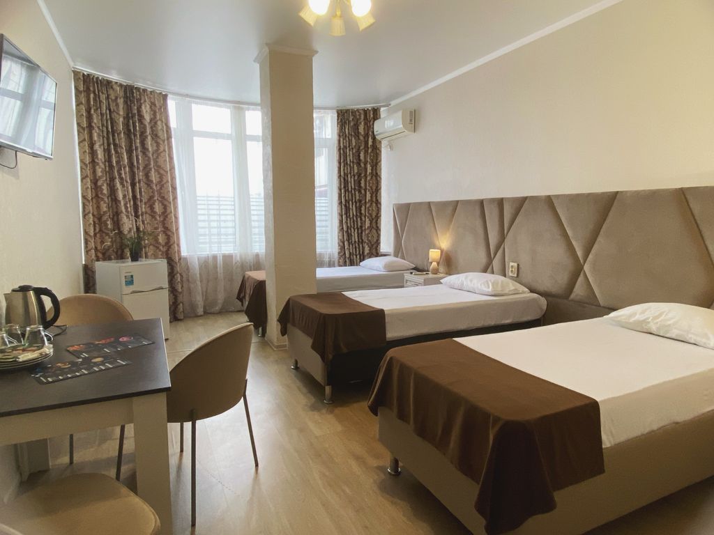 Трёхместный номер улучшенный, три раздельные кровати