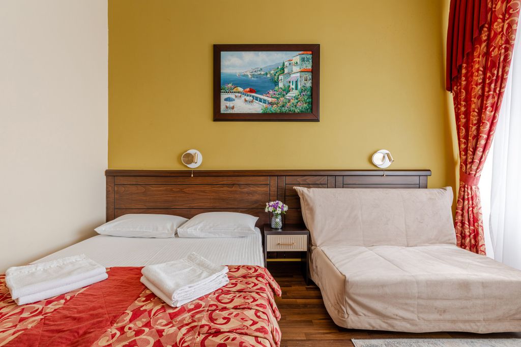 Четырёхместный номер Семейный стандарт с балконом