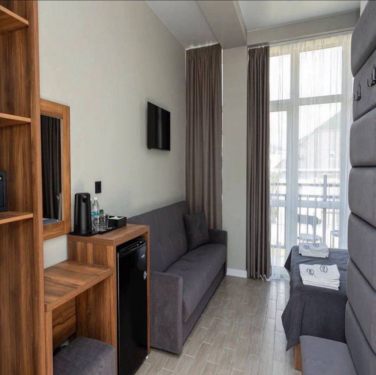 Трёхместный номер комфорт с видом на горы