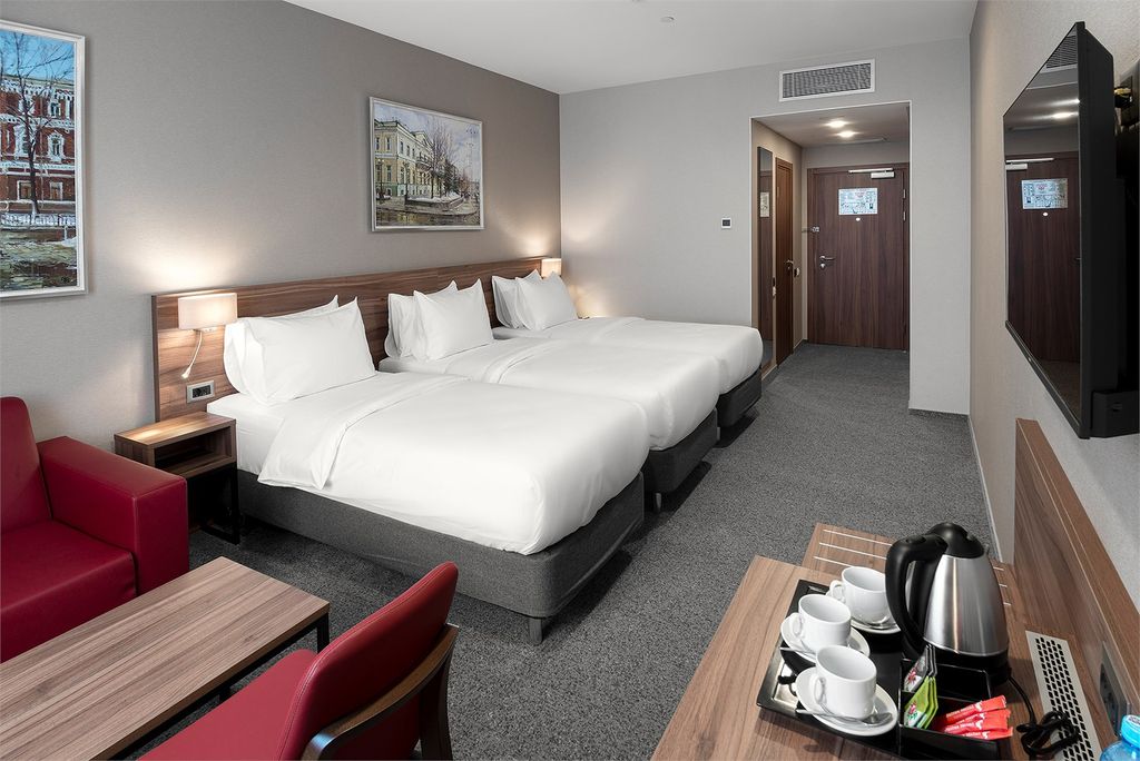 Трёхместный номер делюкс с тремя кроватями