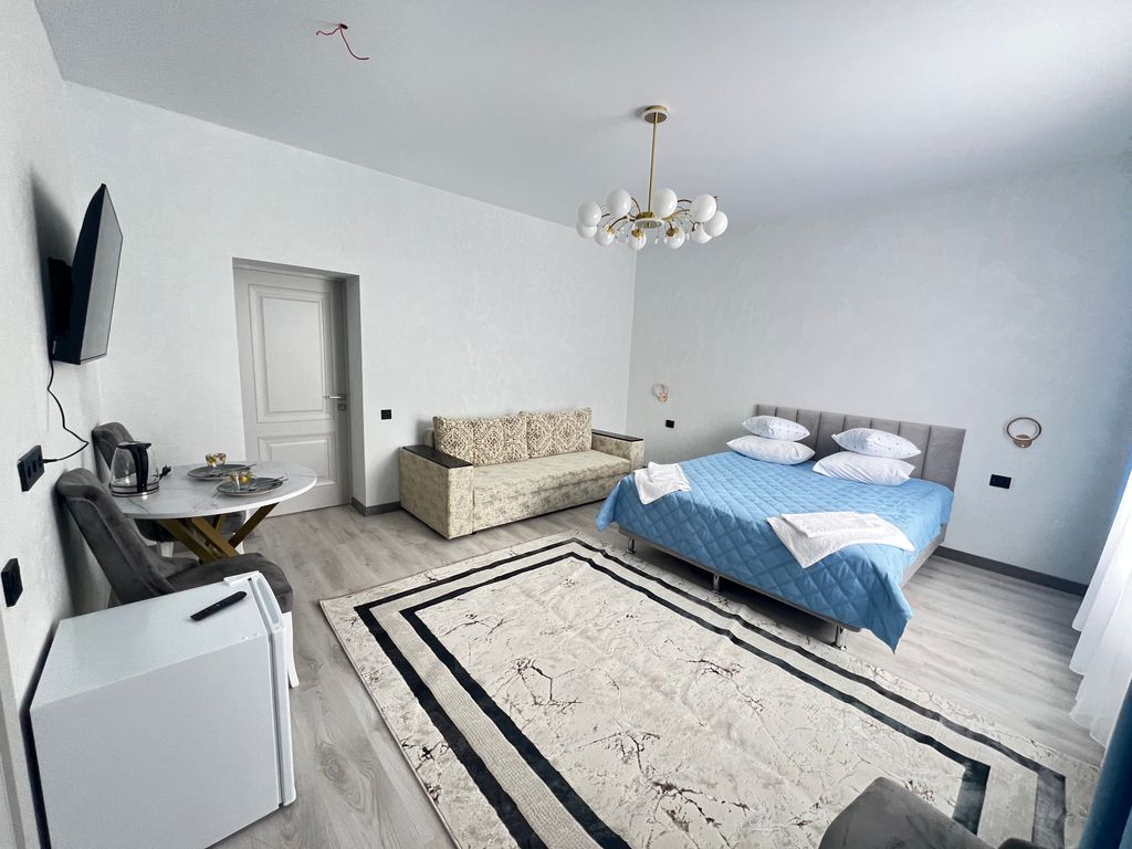 Четырёхместный номер Люкс 37 с красивом видом горы