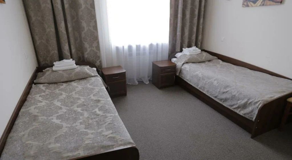 Двухместный номер с 2 отдельными кроватями стандарт