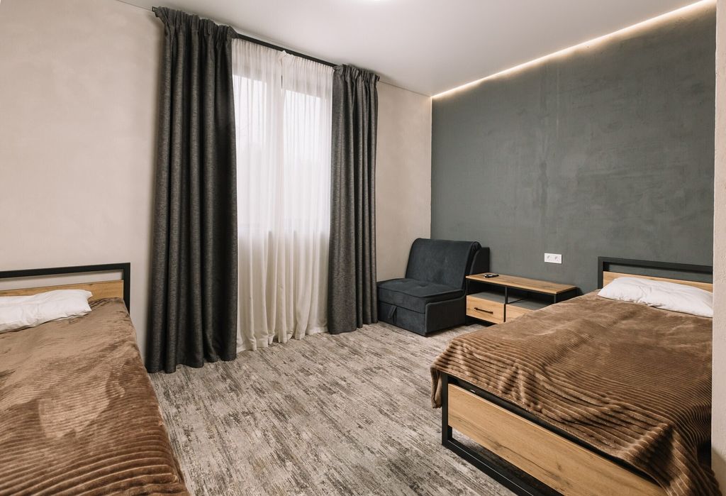 Апартаменты с двумя 1,5-спальными кроватями и доп место