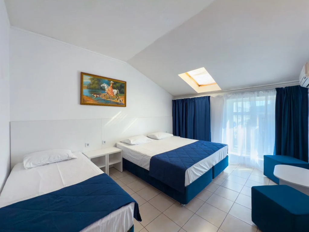 Трёхместный номер Трехместный стандарт