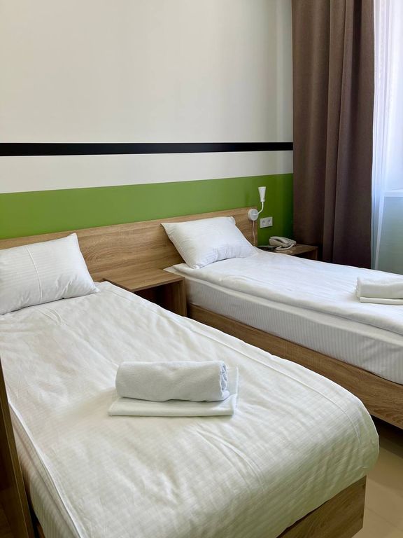 Двухместный номер с 2 отдельными кроватями стандарт