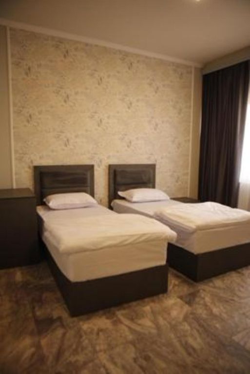 Двухместный номер с 2 отдельными кроватями стандарт