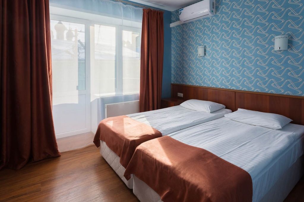 Двухместный номер с 2 отдельными кроватями первая категория