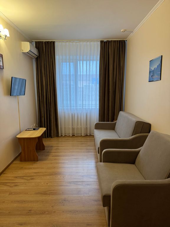 Семейный номер люкс с видом на город