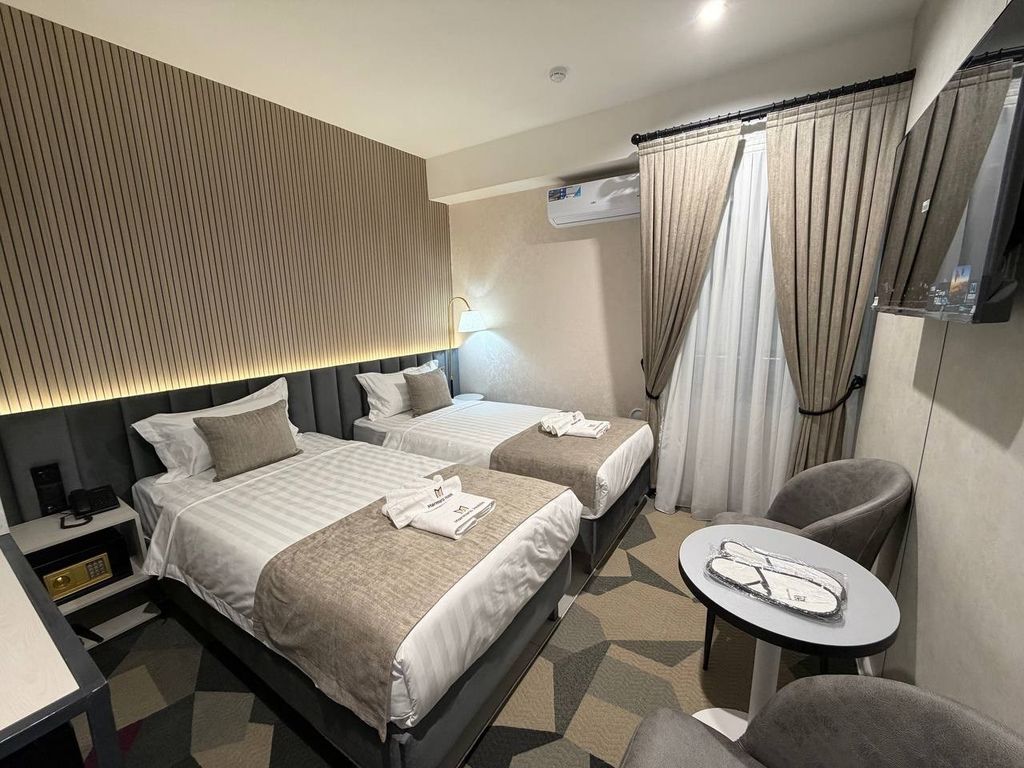 Двухместный номер с 2 отдельными кроватями или 1 двуспальной стандарт