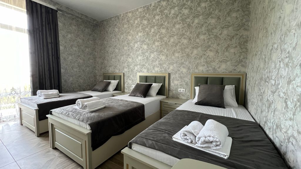 Трёхместный номер Трехместный комфорт (три односпальные кровати)