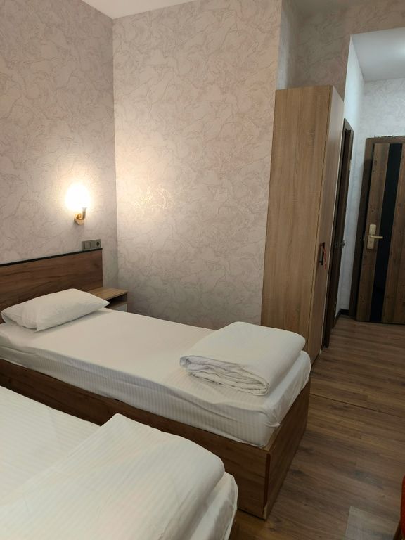 Двухместный номер с 2 отдельными кроватями стандарт