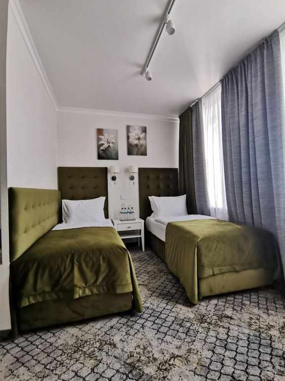 Двухместный номер с 2 отдельными кроватями стандарт