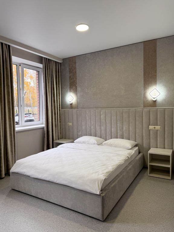 Четырёхместный номер Четырехместный номер с двуспальной кроватью и двуспальным диваном