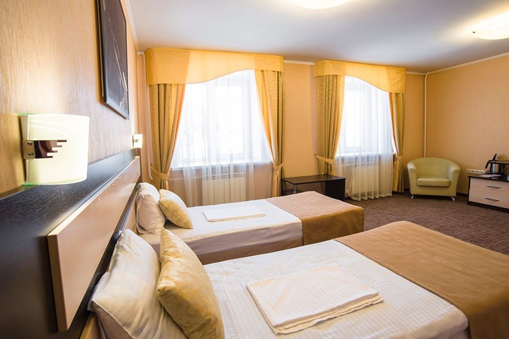 Двухместный номер с 2 отдельными кроватями полулюкс