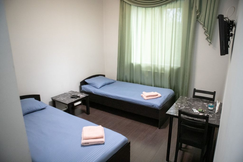 Двухместный номер с 2 отдельными кроватями стандарт