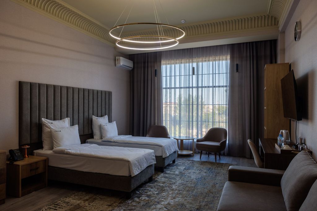 Двухместный номер с 2 отдельными кроватями Стандарт улучшенный