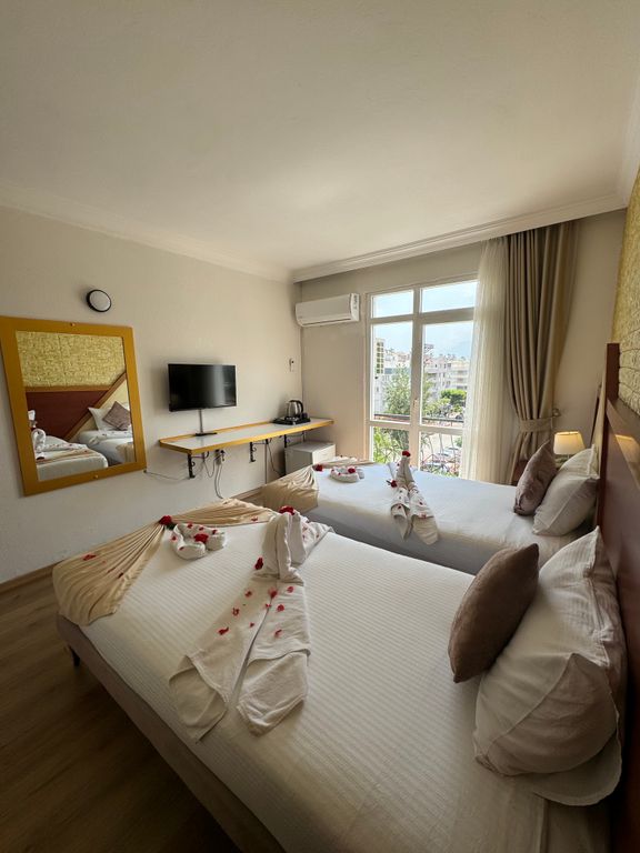 Двухместный номер с 2 отдельными кроватями стандарт