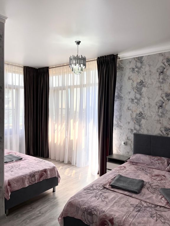 Трёхместный номер люкс с видом на море