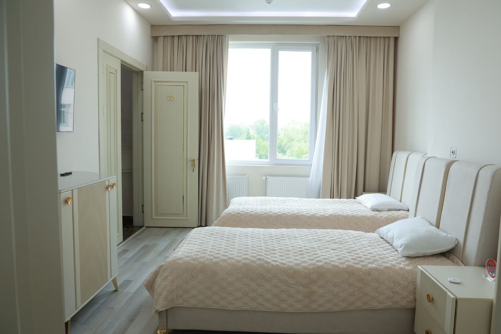 Двухместный номер с 2 отдельными кроватями стандарт