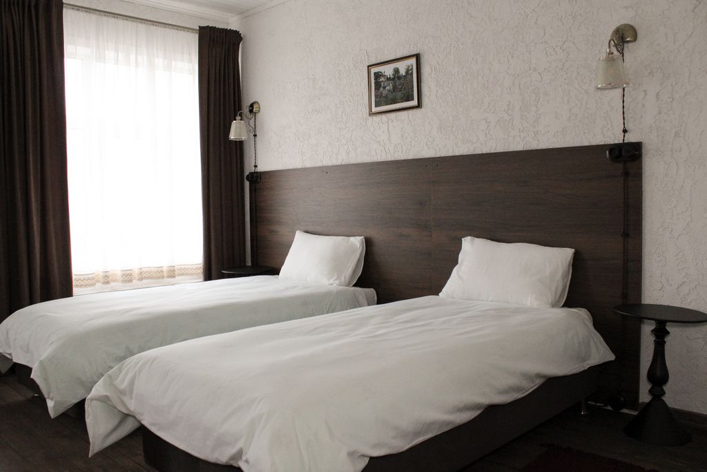 Двухместный номер с 2 отдельными кроватями улучшенный