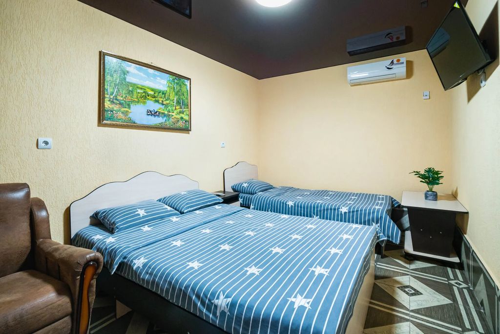 Трёхместный номер Стандарт 3+1