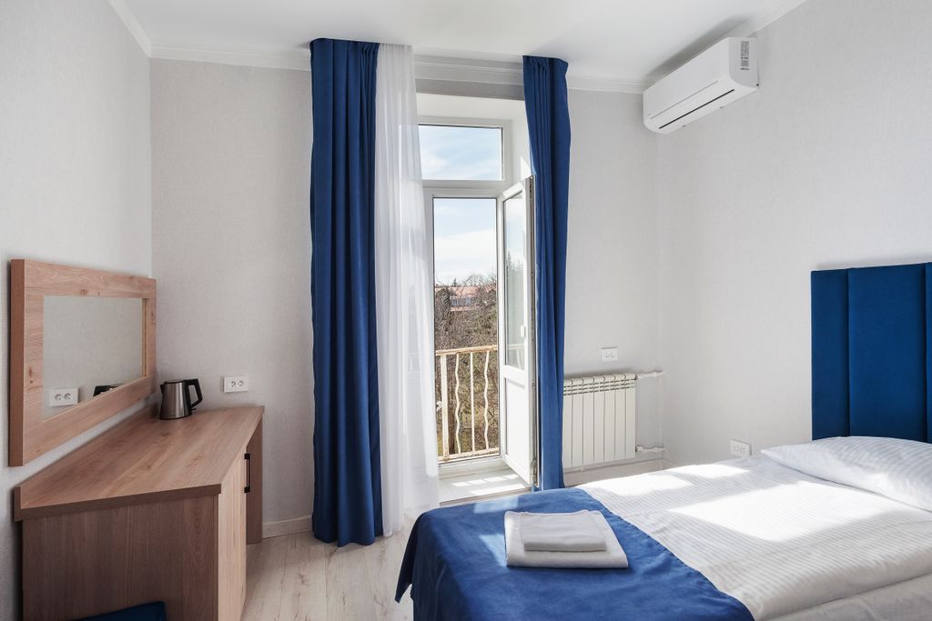 Двухместный номер с 2 отдельными кроватями стандарт