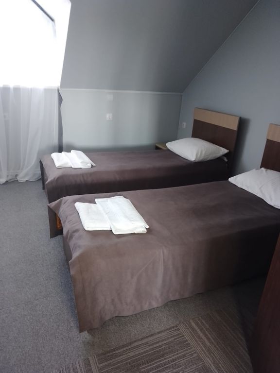 Двухместный номер с 2 отдельными кроватями Стандарт Комфорт с 2 односпальными кроватями(мансарда)