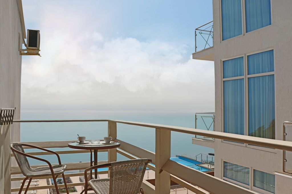 Трёхместный номер Делюкс