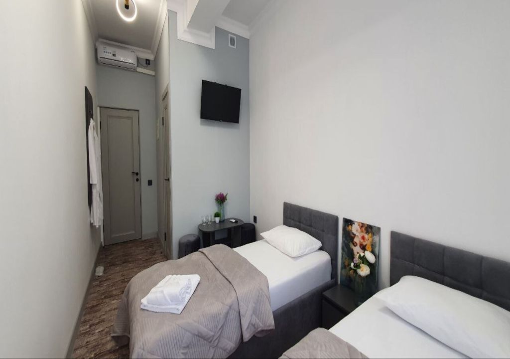 Двухместный номер с 2 отдельными кроватями комфорт