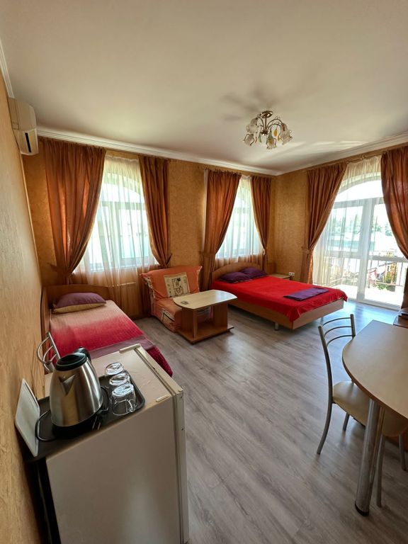 Четырёхместный номер улучшенный с балконом