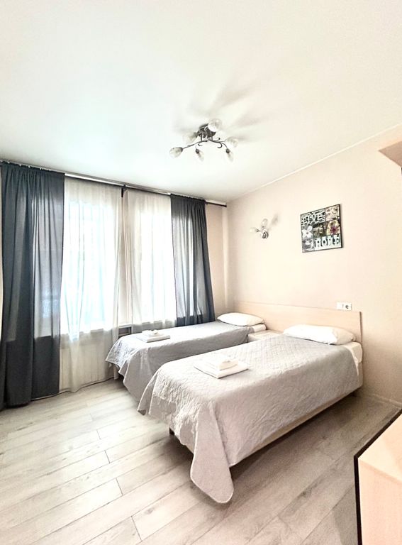 Двухместный номер с 2 отдельными кроватями улучшенный