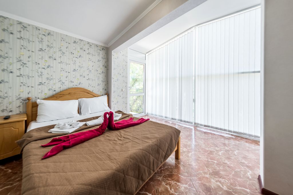 Апартаменты Двухкомнатный люкс с балконом и видом на море