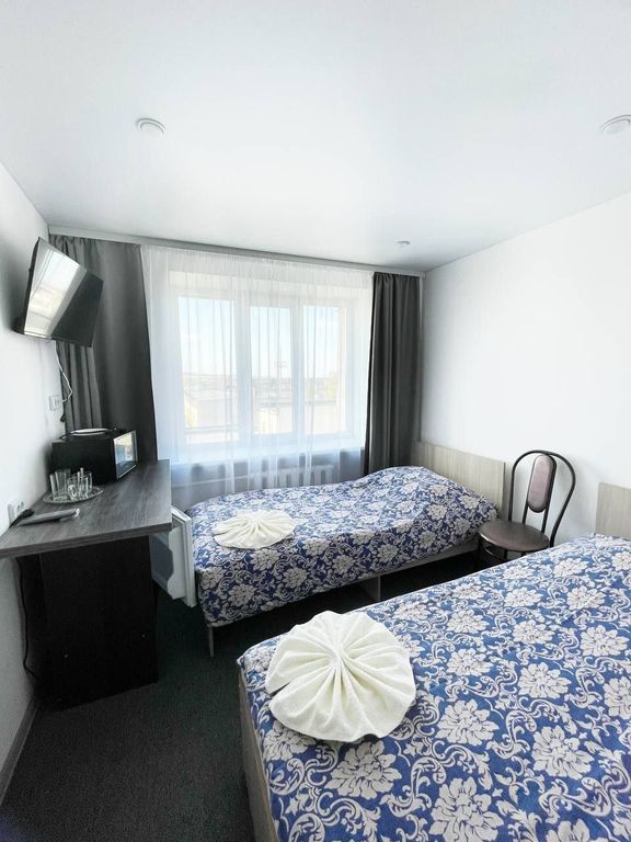 Двухместный номер с 2 отдельными кроватями стандарт +