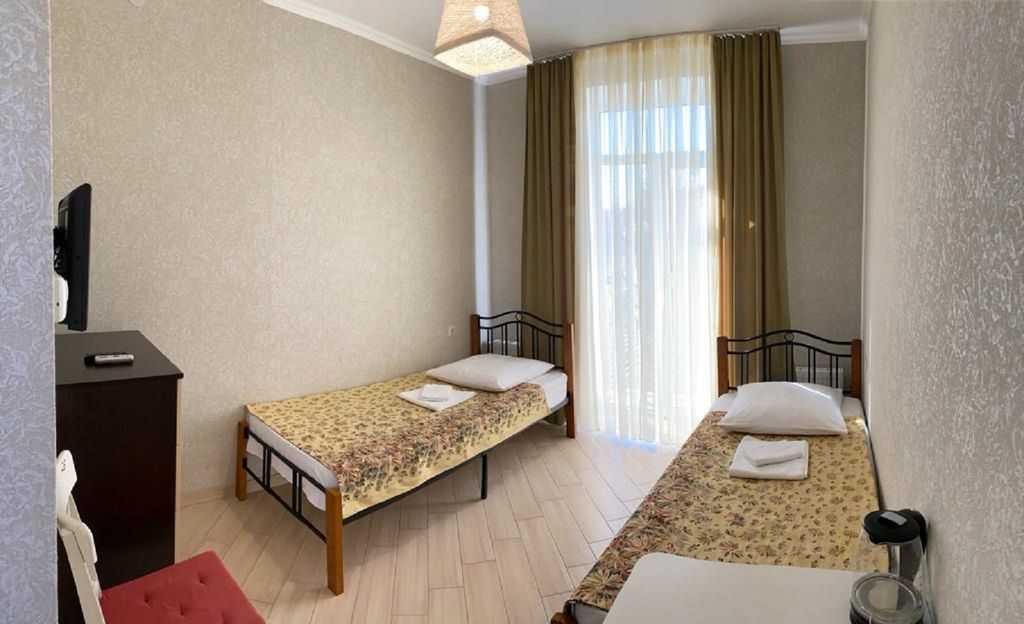 Двухместный номер с 2 отдельными кроватями стандарт