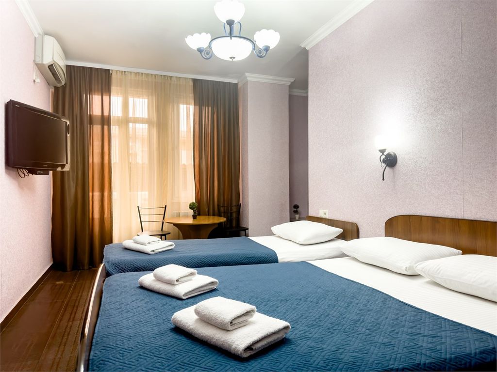 Двухместный номер с 2 отдельными кроватями комфорт с балконом