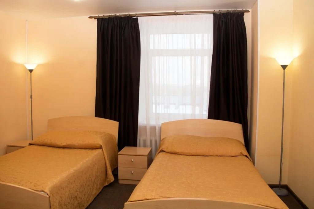 Двухместный номер с 2 отдельными кроватями стандарт 1+1-первой категории