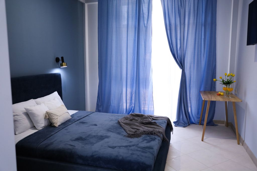 Трёхместный номер стандарт с балконом