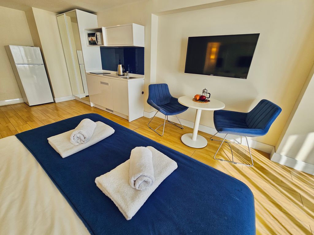 Трёхместный номер Номер-студия Deluxe