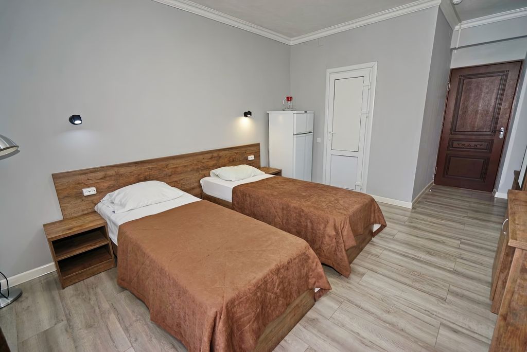 Двухместный номер с 2 отдельными кроватями  комфорт с удобствами