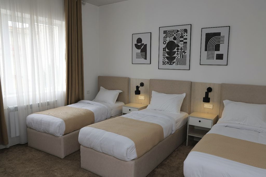 Трёхместный номер делюкс