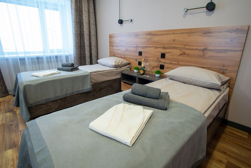 Двухместный номер с 2 отдельными кроватями улучшенный