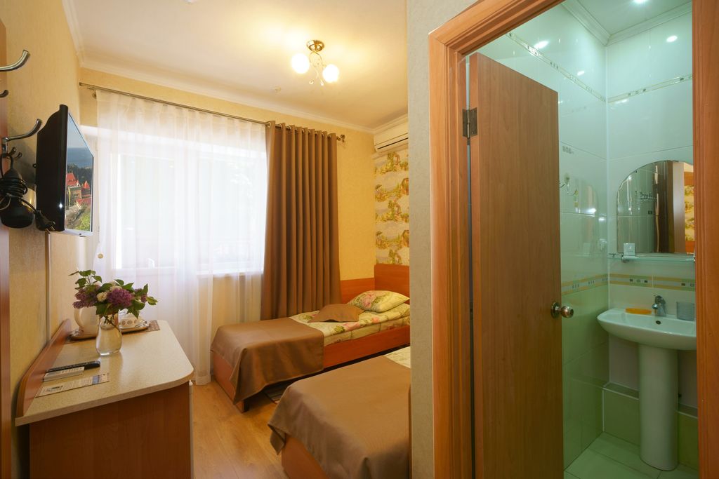 Двухместный номер с 2 отдельными кроватями стандарт