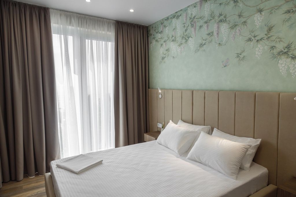 Четырёхместный номер "Делюкс" с панорамным видом на море