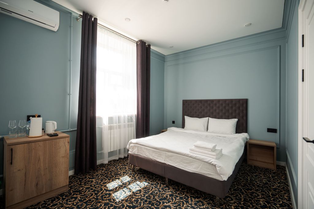 Четырёхместный номер комфорт плюс с балконом